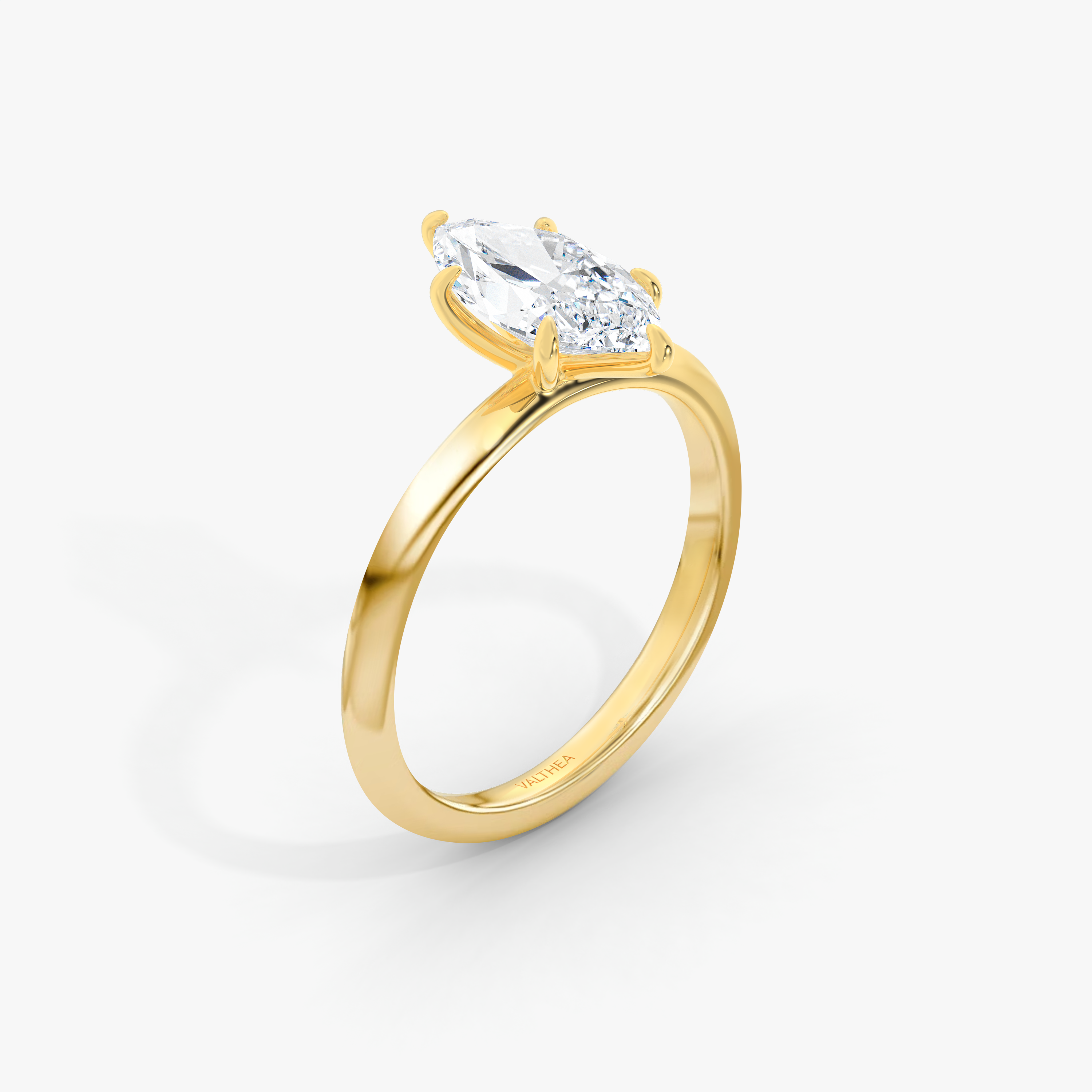 The Signature Round Brilliant Yellow Gold Engagement Ring