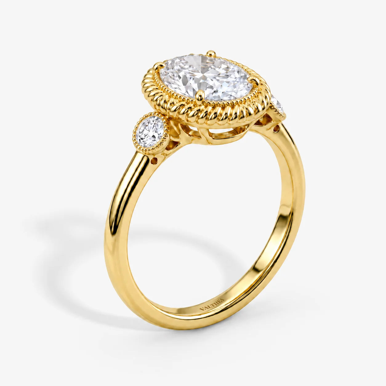 The Filigree Lumiere Oval Solitaire Ring