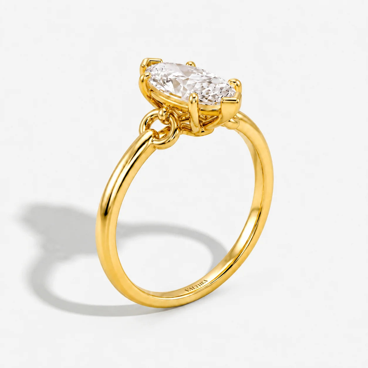 The Lumiere Marquise Bezel Solitaire Ring