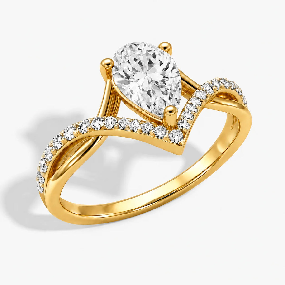 The Couronne Lumiere Pear Solitaire Ring