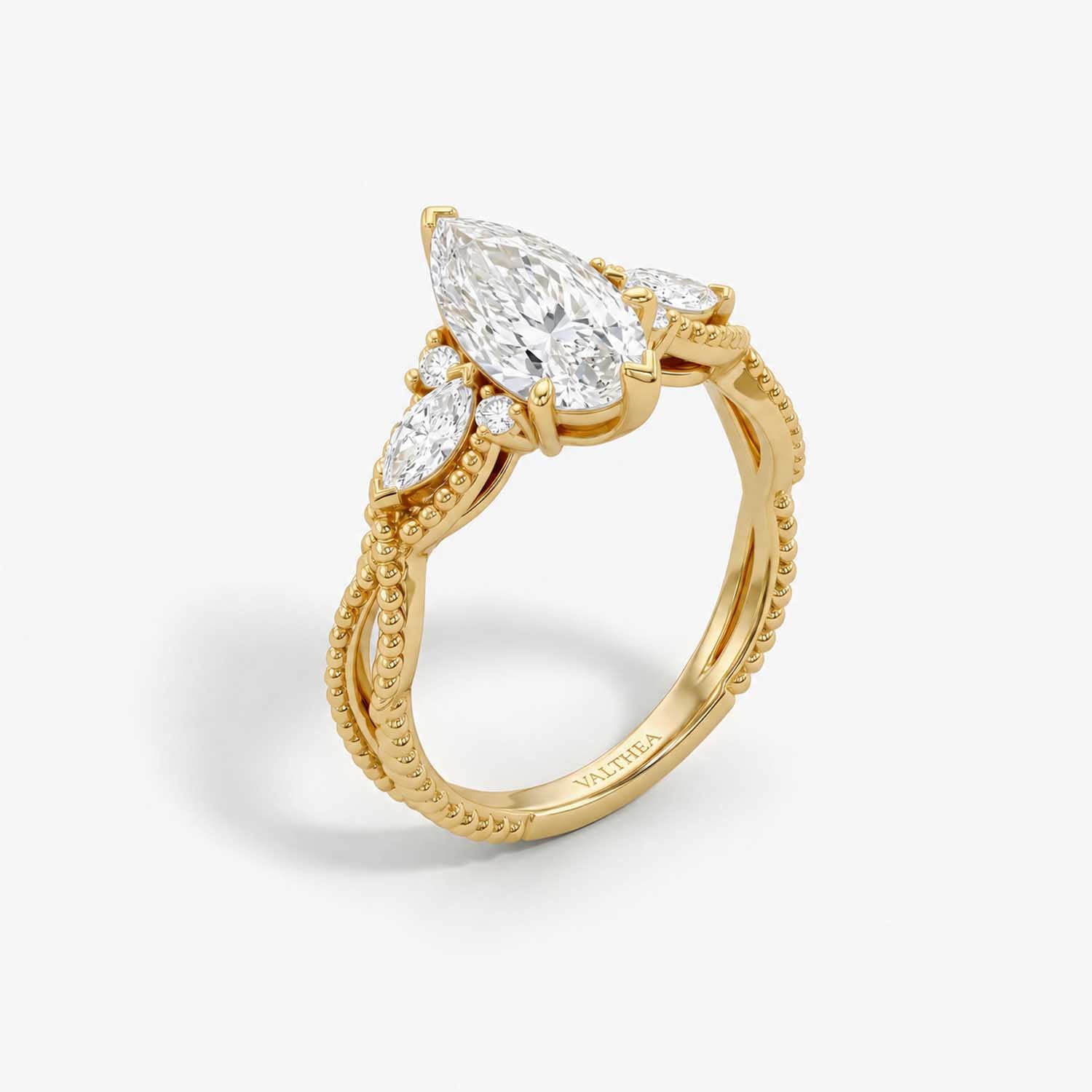 The Astra Bind Pear Solitaire Ring