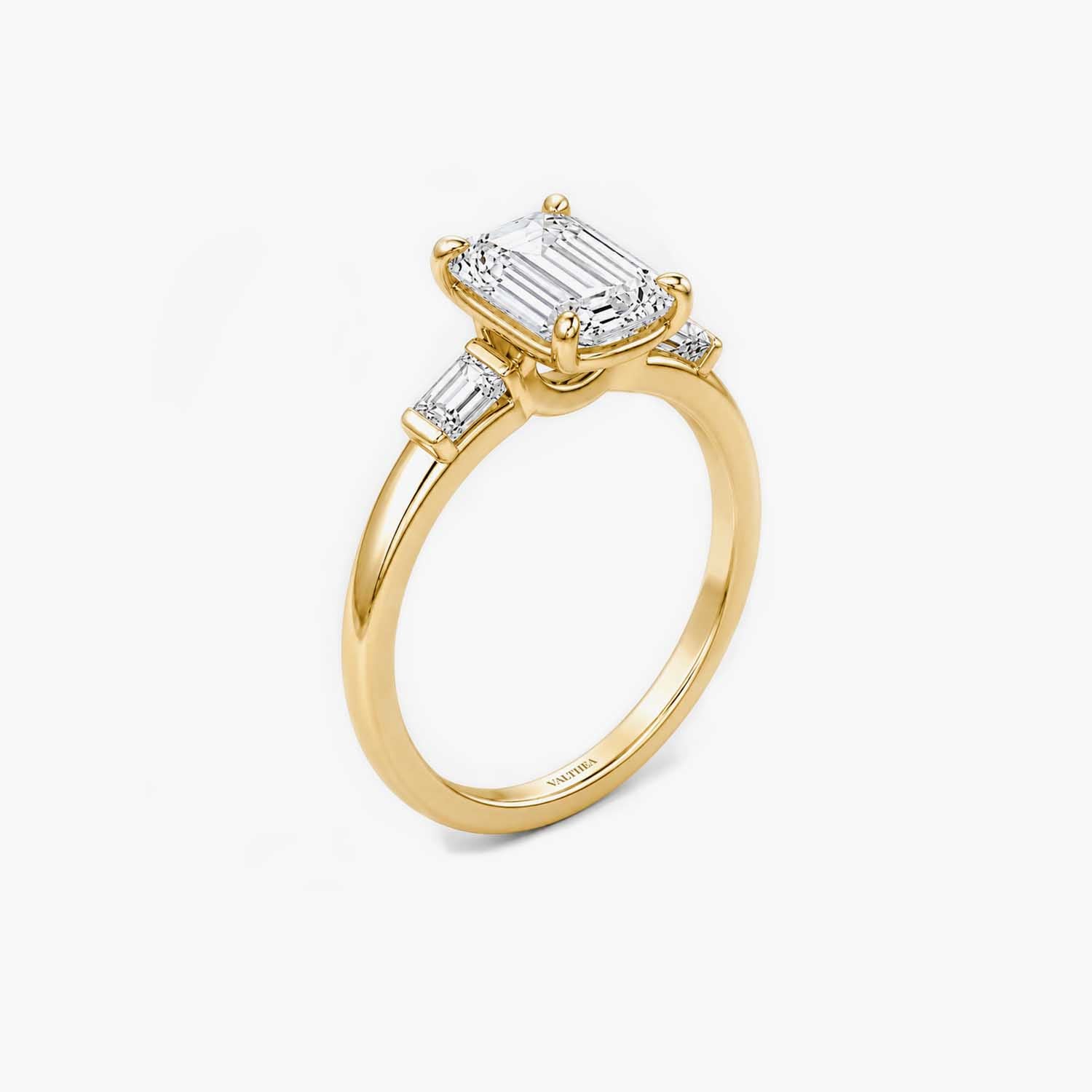 The Edge Emerald Cut Three-Stone Solitaire Ring