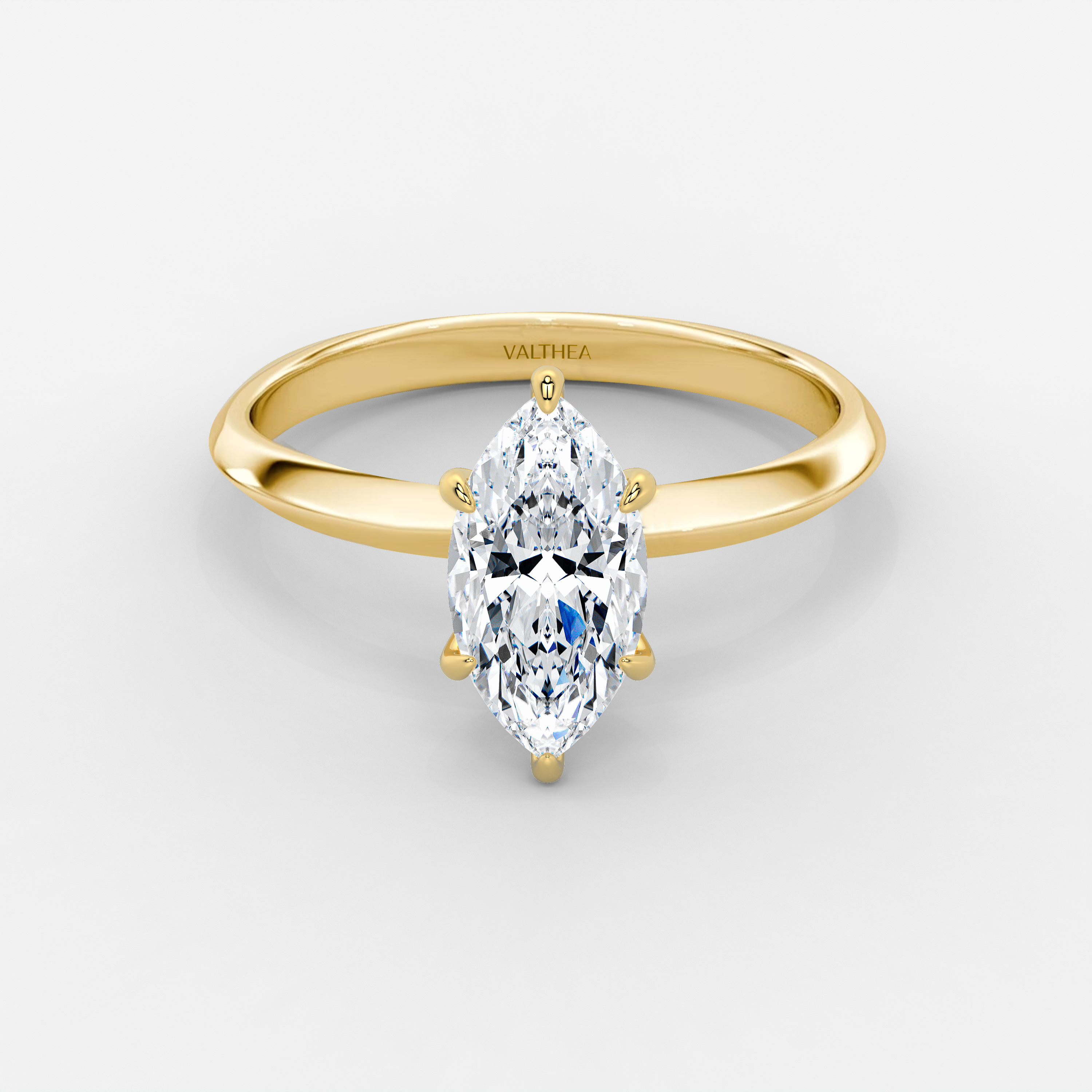 The Signature Round Brilliant Yellow Gold Engagement Ring