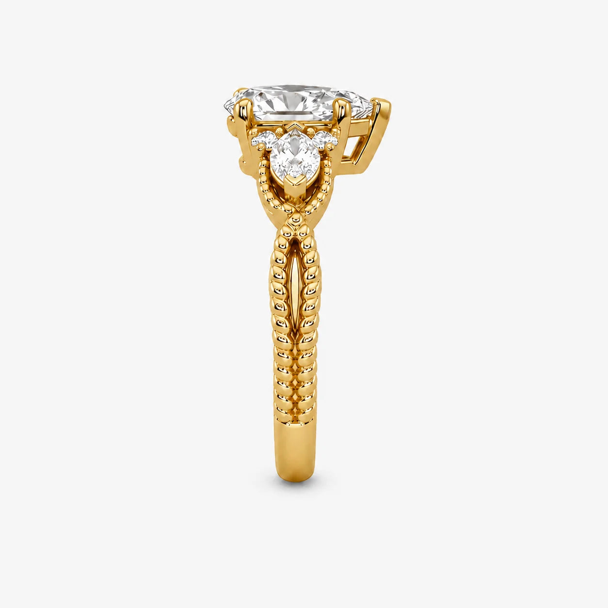 The Astra Bind Pear Solitaire Ring