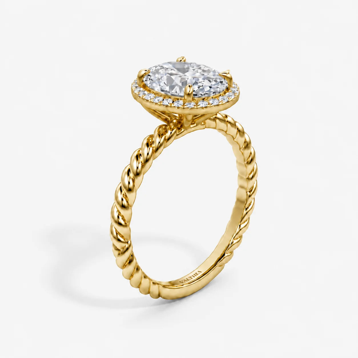 The Lumiere Corda Oval Halo Solitaire Ring