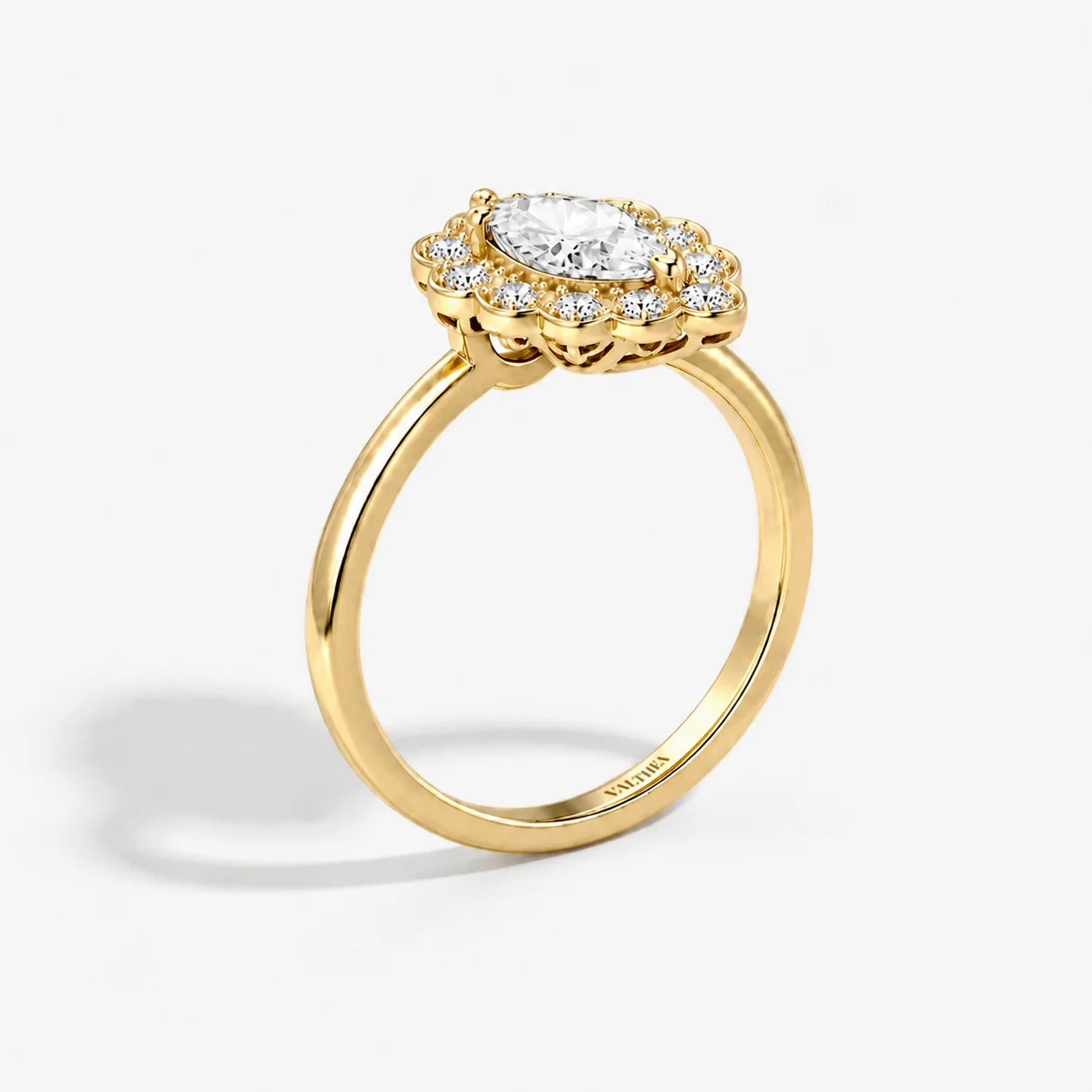 The Lux Ordo Corona Pear Solitaire Ring