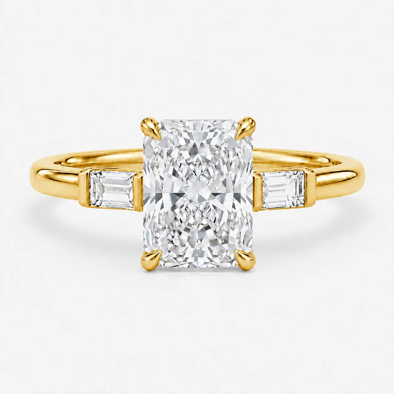 The Edge Emerald Cut Three-Stone Solitaire Ring