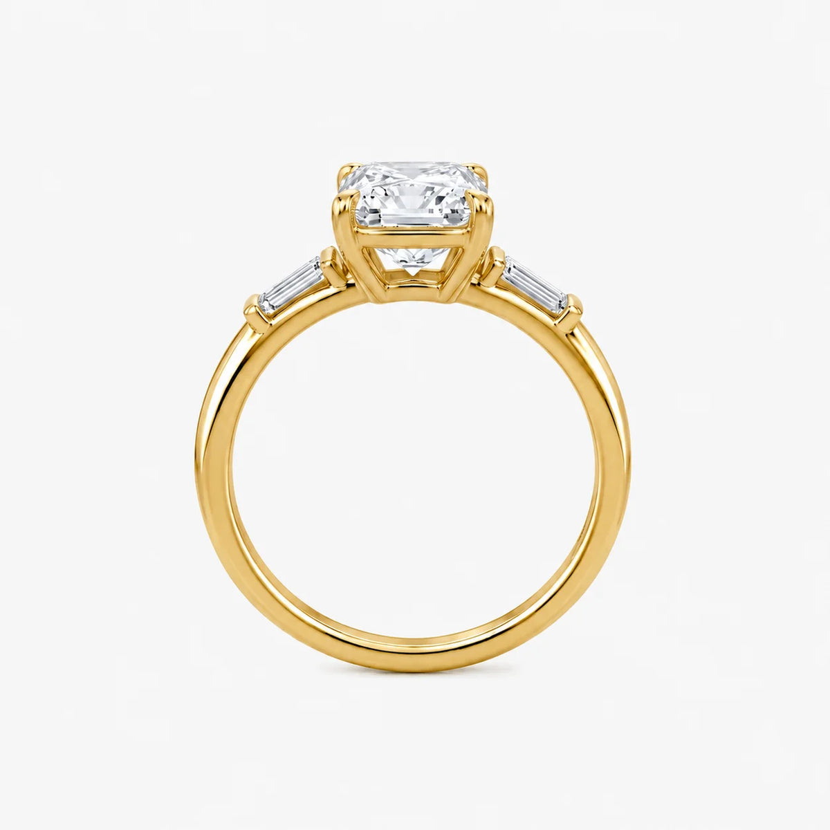 The Edge Emerald Cut Three-Stone Solitaire Ring
