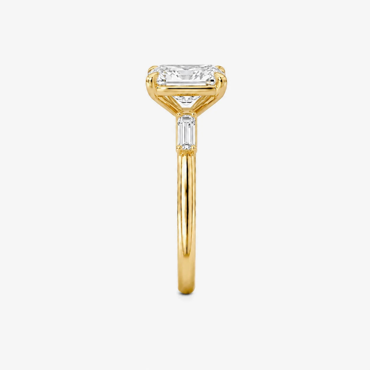 The Edge Emerald Cut Three-Stone Solitaire Ring