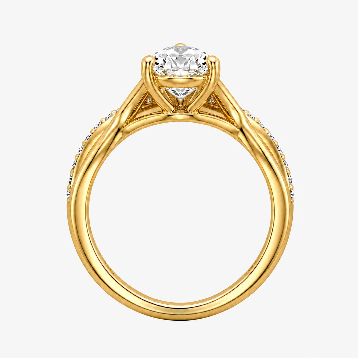 The Couronne Lumiere Pear Solitaire Ring
