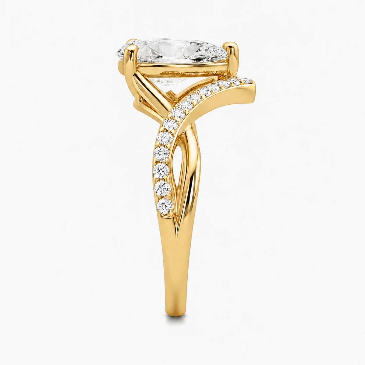 The Couronne Lumiere Pear Solitaire Ring