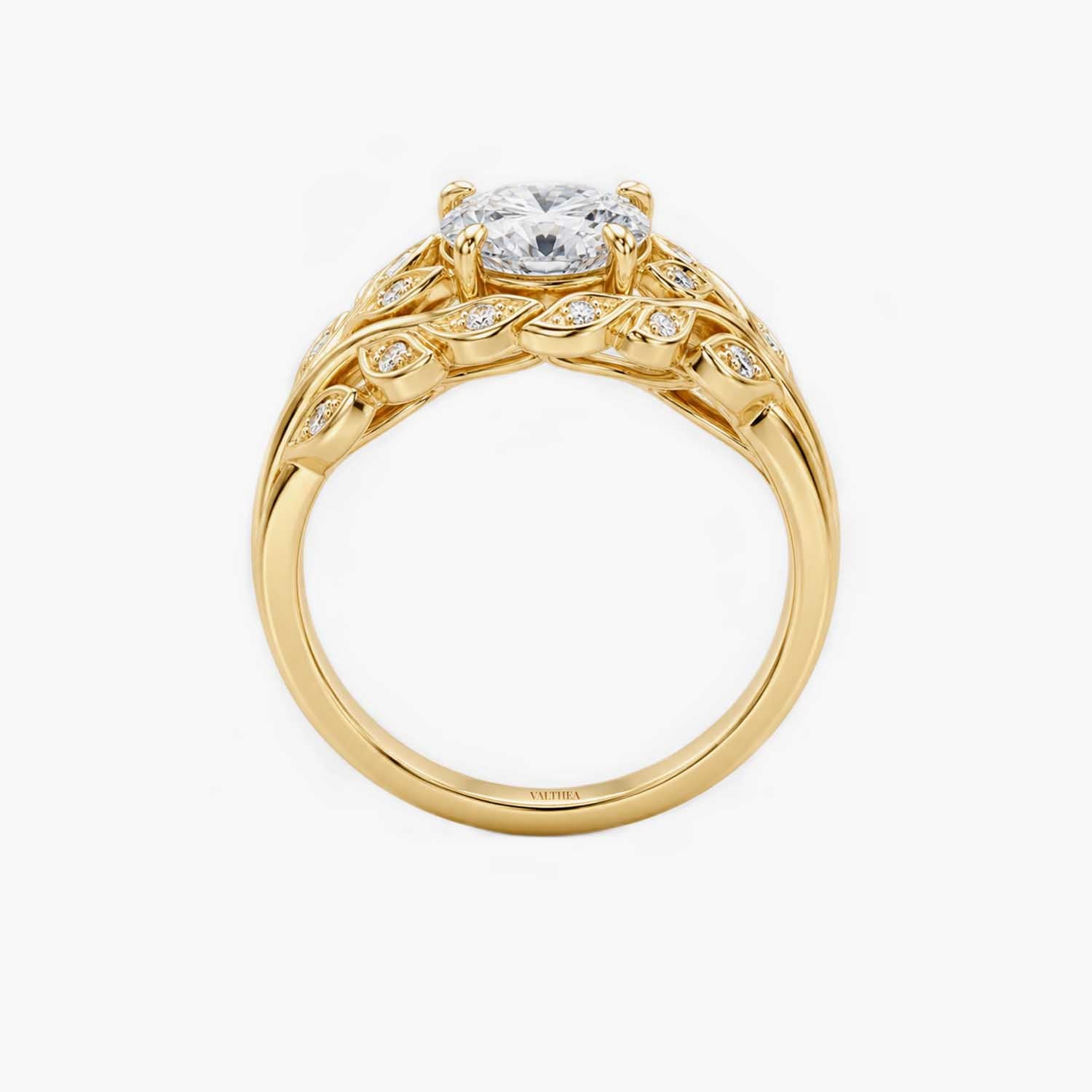 The Clementia Lumiere Oval Filigree Olive Leaf Ring