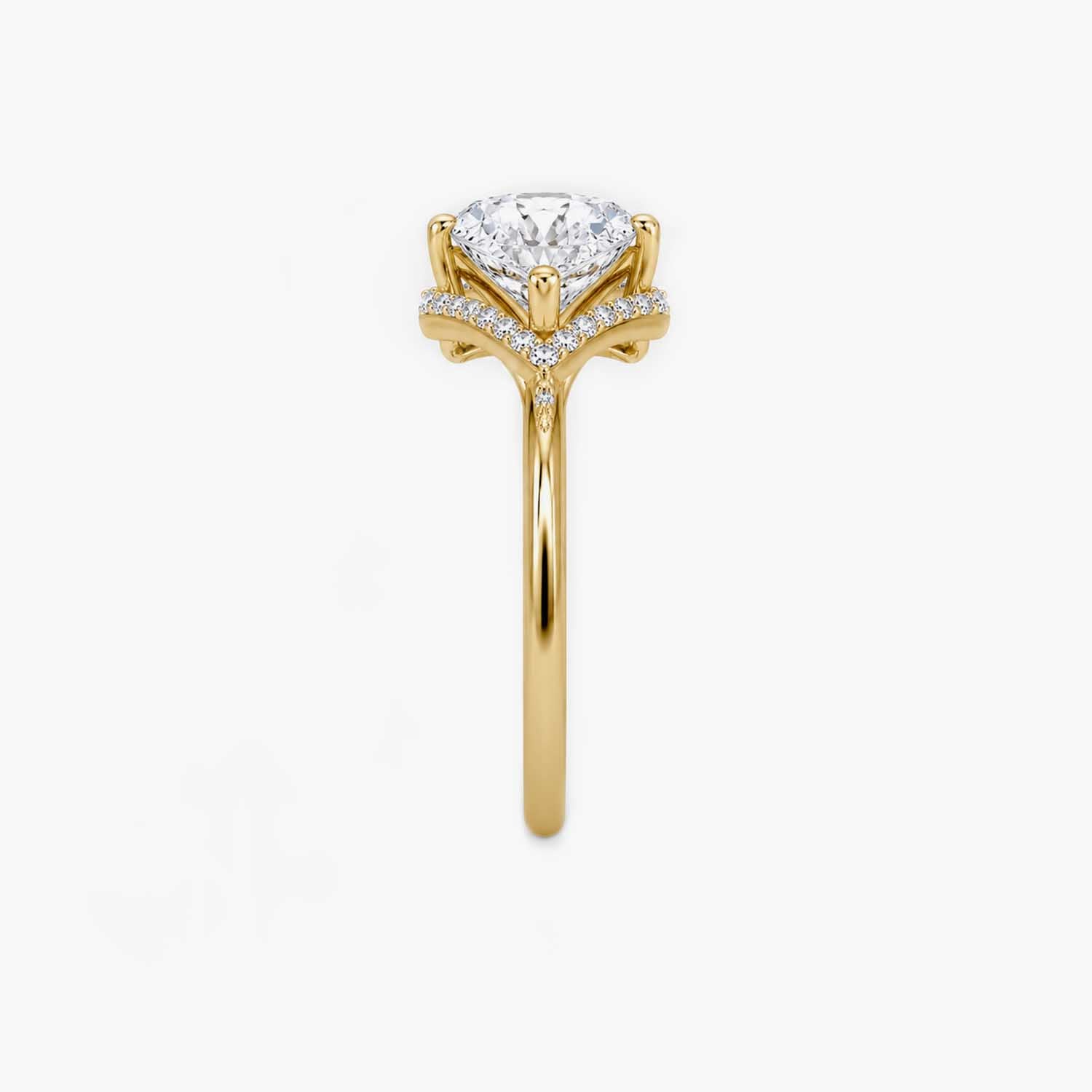 The Couronne Lumiere Pear Solitaire Ring